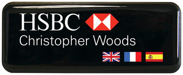 A prestige name badge brushed design with black background with the leyend: "HSBC"